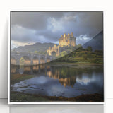 Framed acrylic artwork showcasing a picturesque landscape with a castle surrounded by lush greenery, displayed in a white frame for a modern aesthetic. Ideal for enhancing home decor with scenic beauty.
