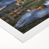 Rolled canvas art print showcasing a picturesque landscape with a medieval castle set against a vibrant sunset, beautifully packaged in a protective cardboard tube. Perfect for adding a touch of elegance to any home decor.