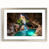 Silver-framed landscape cave artwork with a mat, showcasing intricate details and vibrant colors, ideal for home decor or art collectors.