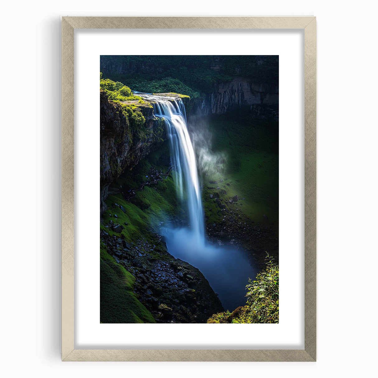 Framed landscape artwork of dramatic cliffs in silver matting, showcasing vibrant colors and intricate details, perfect for enhancing modern home decor.