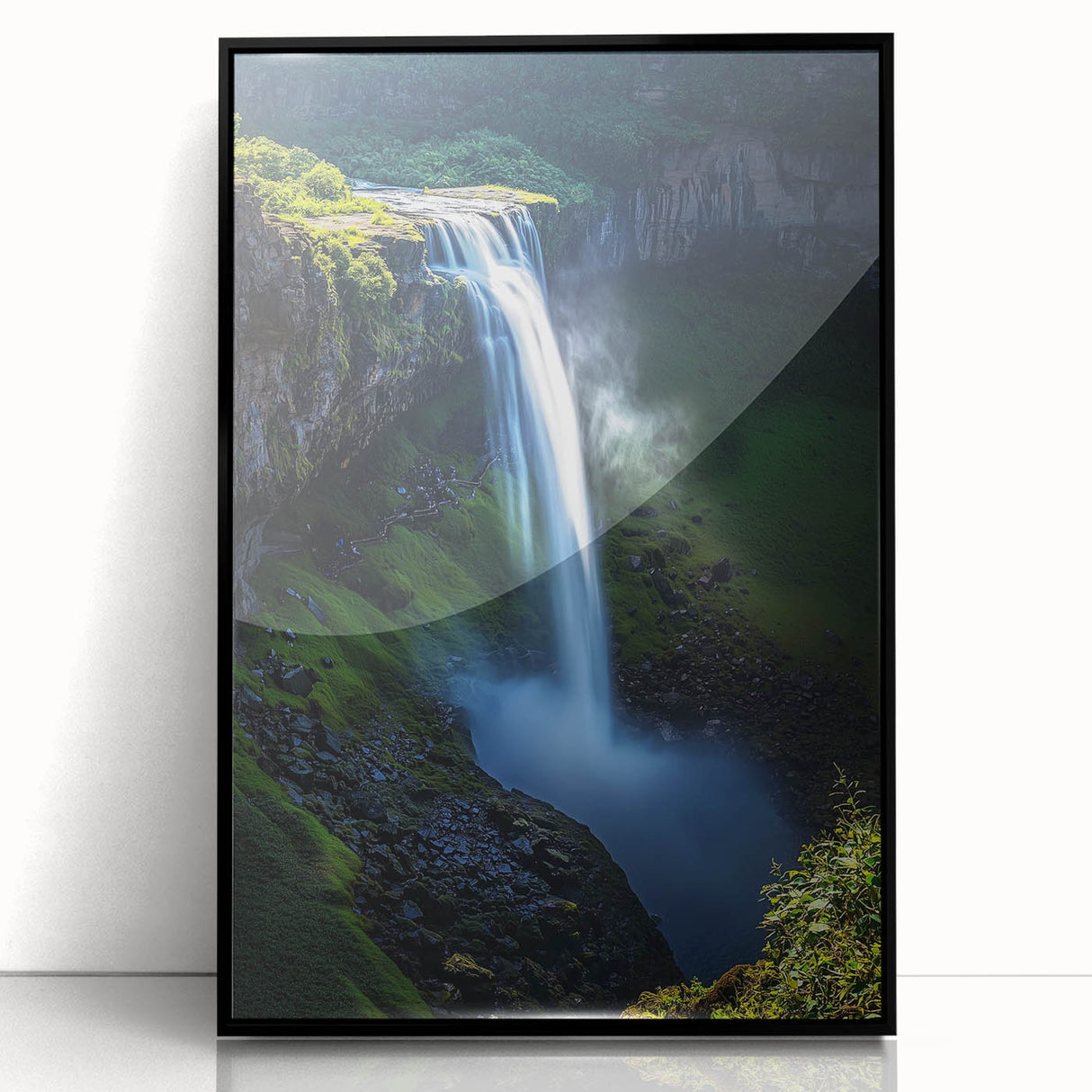 Framed acrylic landscape artwork showcasing dramatic cliffs against a vibrant blue sky, highlighting intricate textures and bold colors, perfect for home decor.