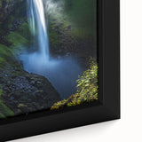 Close-up of a framed canvas print showcasing a dramatic landscape of rugged cliffs and vibrant skies, perfect for enhancing home decor with nature's beauty. The artwork captures intricate details and rich colors, making it an eye-catching focal point for any room.