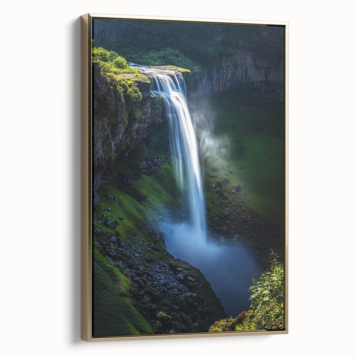 Framed canvas artwork depicting a dramatic landscape scene with cliffs, featuring rich gold accents and a sleek side view, ideal for modern home decor.