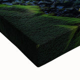 Close-up of a stretched canvas artwork depicting dramatic cliffs and landscapes, showcasing vibrant colors and intricate details, perfect for home decor enhancement.