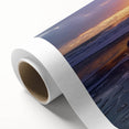 Vibrant landscape canvas art depicting serene beaches at sunset, showcasing rich colors and textures, rolled and ready for display in a protective tube.