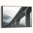 Framed canvas artwork showcasing a stunning landscape view of a bridge, featuring a sleek black frame that enhances its visual appeal, perfect for home decor.