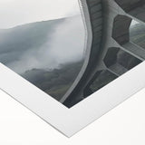 Rolled canvas artwork showcasing a stunning landscape bridge design, featuring vibrant colors and intricate details, packaged securely in a protective cardboard tube.