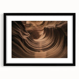 Framed landscape artwork showcasing vibrant canyons in rich earth tones, featuring a sleek black mat and frame, ideal for enhancing home decor and art collections.