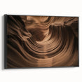 Framed landscape canvas artwork depicting a stunning canyon scene with rich earthy tones and intricate details, featuring a sleek black frame for modern decor. Ideal for enhancing living spaces with natural beauty.