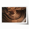 Vibrant landscape print of canyons showcasing rich earth tones, rolled for easy display, ideal for home decor enthusiasts seeking nature-inspired art.