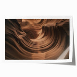Vibrant landscape print of canyons showcasing rich earth tones, rolled for easy display, ideal for home decor enthusiasts seeking nature-inspired art.