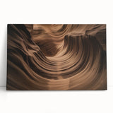 Stretched canvas artwork depicting a vibrant landscape of canyons in warm earth tones, ideal for modern home decor. Perfect for nature enthusiasts seeking artistic inspiration.