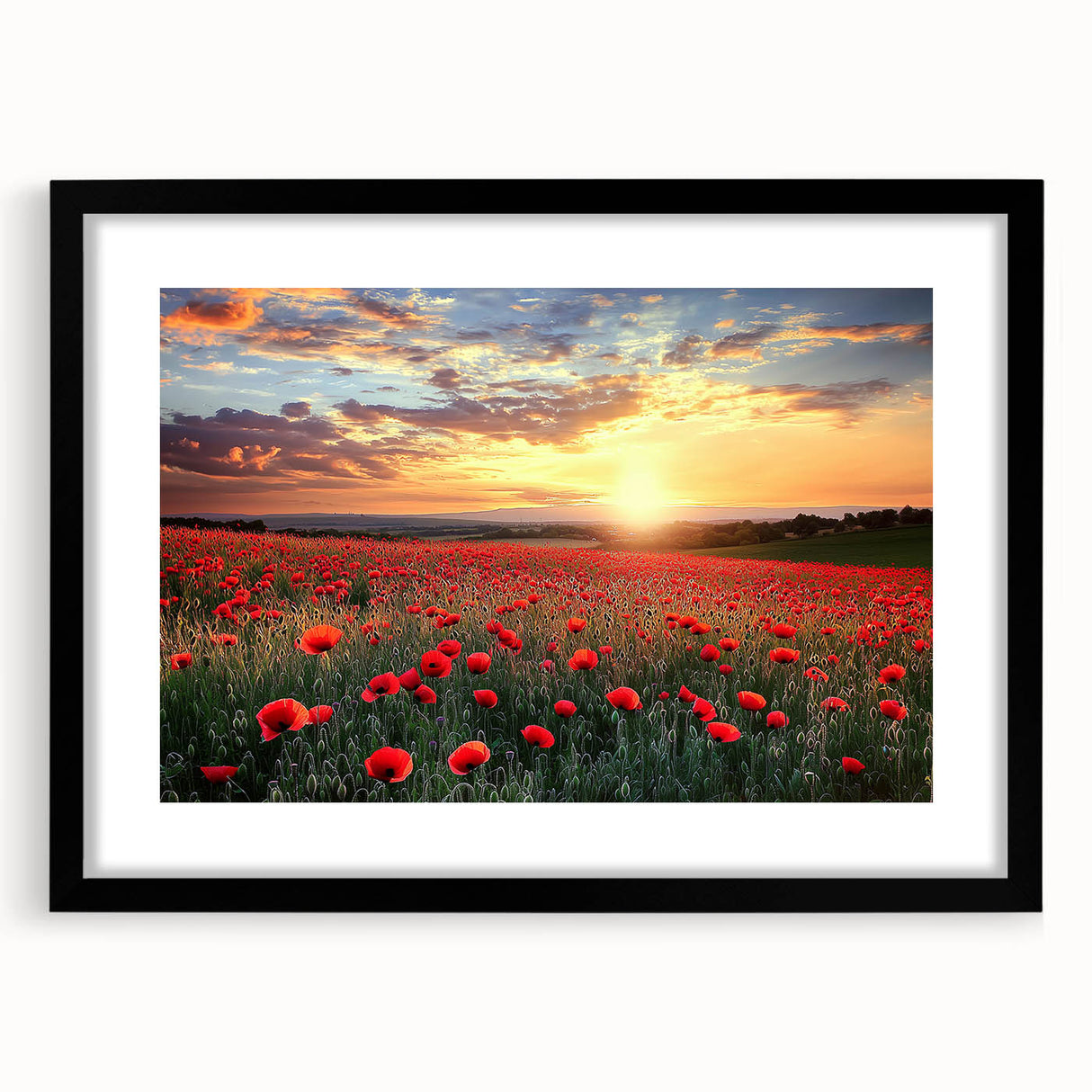 Black-framed landscape artwork featuring a serene countryside scene with lush greenery and a clear blue sky, ideal for home decor or office styling.