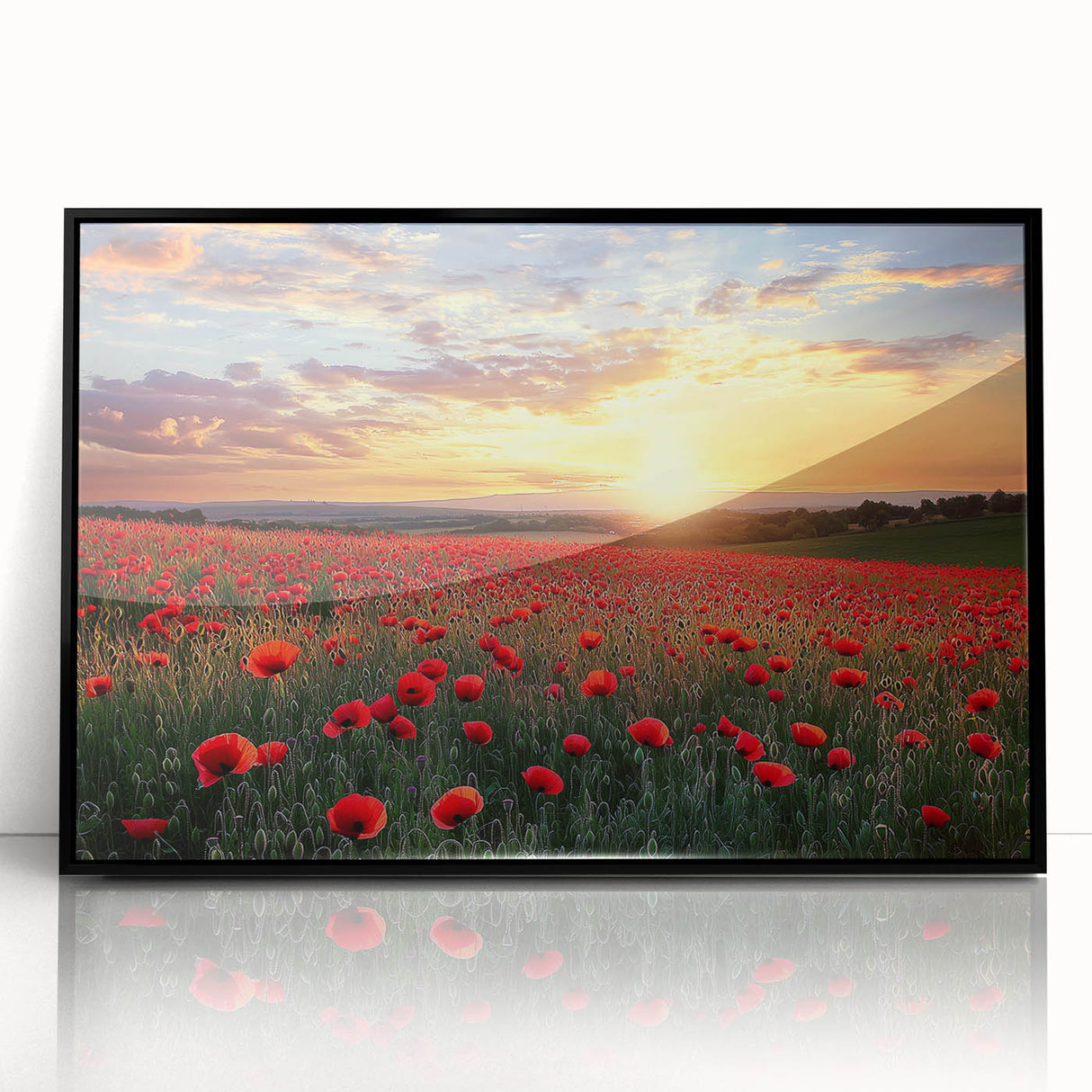 Framed acrylic landscape artwork showcasing a serene countryside scene, featuring lush green fields and a clear blue sky, presented in a sleek black frame.