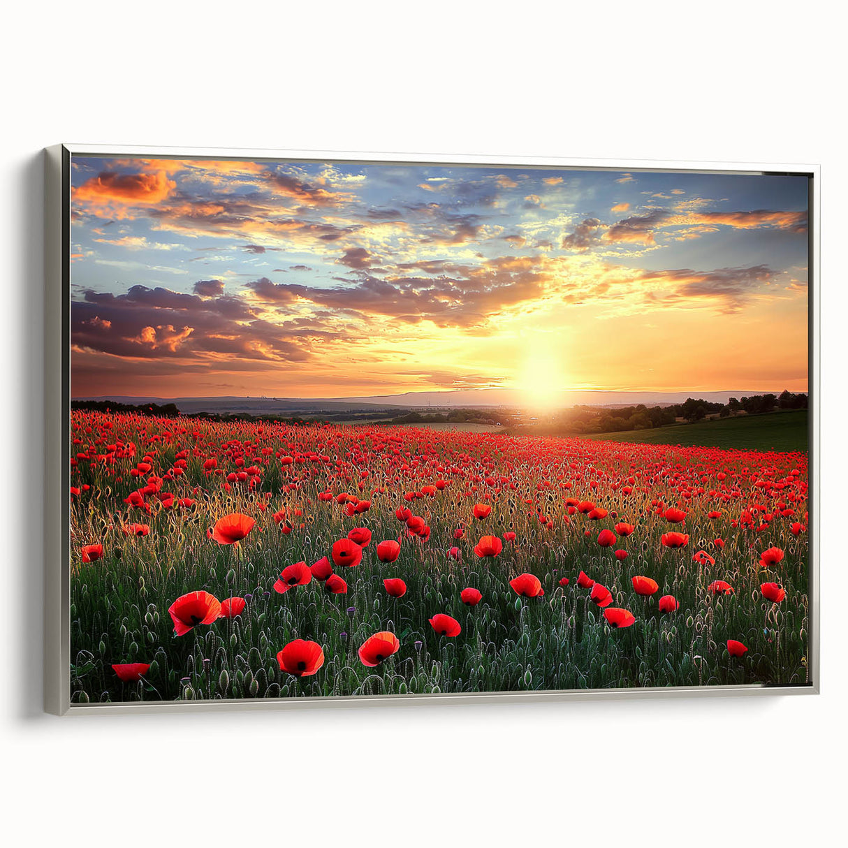 Framed canvas showcasing a serene countryside landscape with vibrant green fields and blue skies, elegantly bordered in silver for a modern touch.