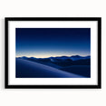 Framed desert landscape artwork in a sleek black frame, featuring warm tones of sand and sky, ideal for enhancing modern home decor. The mat adds a refined touch to the overall presentation, making it a perfect centerpiece for living spaces.