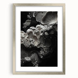 Textured abstract art print in neutral shades, displayed in a silver frame with mat, suitable for bedroom decor.