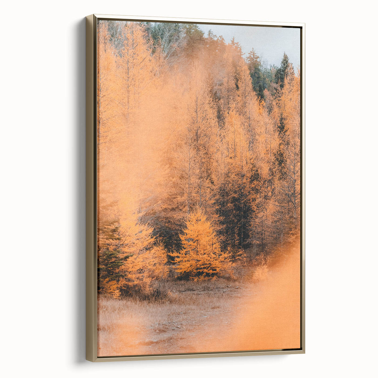 Framed canvas depicting a vintage-style landscape with autumnal trees in muted gold and black tones.