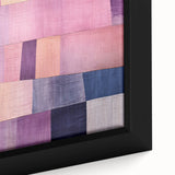Close-up of a framed canvas wall art featuring abstract strokes in vibrant colors, showcasing textured details and a modern aesthetic ideal for contemporary home decor.