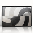 Framed abstract wall art showcasing vibrant strokes in black and gold, perfect for modern home decor. Ideal for adding a stylish touch to any living space.