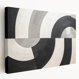 Abstract canvas wall art showcasing vibrant strokes in shades of blue, gold, and white. The artwork is stretched over a wooden frame, offering a modern touch to home decor. This piece enhances contemporary spaces with its dynamic design and color palette.