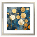 Abstract wall art featuring dynamic strokes in shades of blue and gold, elegantly framed in silver with a white mat, perfect for modern décor.