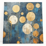 Abstract wall art featuring colorful strokes in vibrant hues of blue, orange, and yellow on a stretched canvas, elegantly leaning against a textured wall, perfect for modern decor.