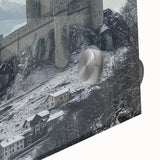 Close-up view of an acrylic glass artwork depicting a picturesque landscape with a majestic castle, showcasing vibrant colors and intricate details, ideal for home decor.