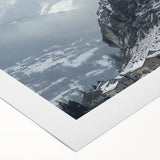 Rolled canvas artwork depicting a picturesque landscape with a majestic castle surrounded by lush greenery, ideal for home decor and art enthusiasts.