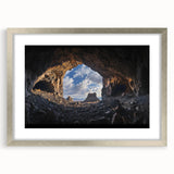 Silver-framed landscape artwork featuring intricate cave designs, elegantly matted for a polished look, perfect for home decor or gallery displays.