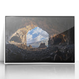 Framed acrylic artwork depicting a stunning cave landscape scene, showcasing vibrant colors and intricate details, displayed against a white frame for a modern aesthetic.