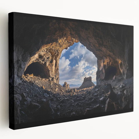 Side view of a stretched canvas depicting a vibrant landscape with caves, showcasing rich colors and intricate details, ideal for home decor or art enthusiasts.