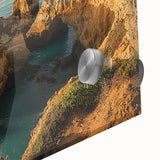 Close-up of a vibrant acrylic landscape painting depicting dramatic cliffs in rich hues of blue and green, showcasing intricate details and textures on glass, perfect for modern home decor.