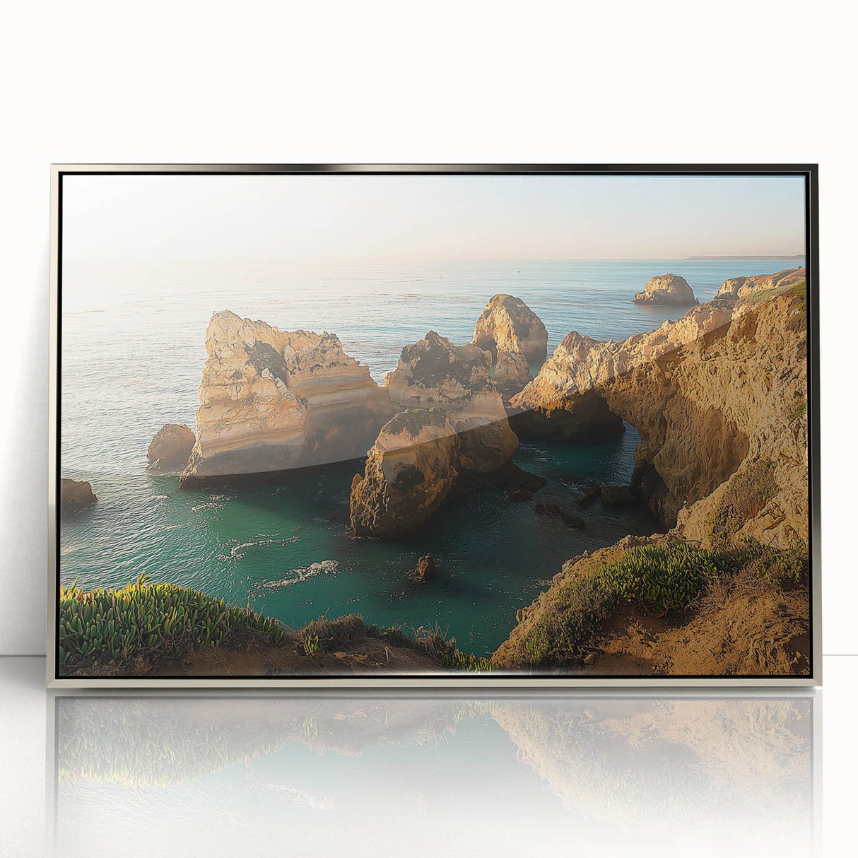 Framed acrylic artwork depicting stunning cliffs and landscapes, featuring a silver frame that enhances the vibrant colors and details of the scene. Ideal for modern home decor.