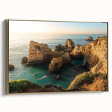 Framed canvas artwork depicting a stunning landscape with dramatic cliffs, featuring rich gold accents and a side view perspective, perfect for modern home decor.