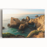 Stretched canvas artwork depicting a stunning landscape of dramatic cliffs under a vibrant sunset, showcasing rich colors and intricate details, ideal for home decor.