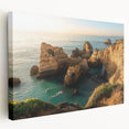 Stretched canvas artwork depicting a breathtaking landscape of rugged cliffs under a vibrant sunset, showcasing rich colors and intricate details, perfect for home décor.