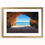 Elegant gold-framed landscape artwork showcasing a serene beach scene with soft waves, sandy shores, and a calming sky, perfect for home decor enhancement.