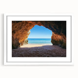 Framed landscape artwork depicting serene beaches with gentle waves, featuring a white mat and sleek frame, perfect for enhancing home decor.