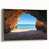 Framed canvas artwork showcasing a serene beach landscape with soft waves, palm trees, and a silver frame, ideal for enhancing coastal home decor.