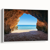 Framed canvas artwork showcasing a serene beach landscape, featuring soft pastel colors and gentle waves, presented in a sleek white frame for elegant home decor.