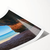 Vibrant rolled print showcasing a tropical beach landscape, featuring soft waves and golden sand, perfect for enhancing coastal-themed decor in homes or offices.