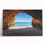 Stretched canvas artwork depicting a serene beach landscape with vibrant blue skies and gentle waves, ideal for coastal home decor, adding tranquility to any space.