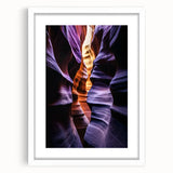Framed landscape artwork depicting vibrant canyons, featuring a white mat and sleek frame, ideal for enhancing home decor with natural beauty.