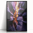 Framed acrylic artwork showcasing a vibrant landscape of canyons with striking colors, presented in a sleek black frame, ideal for modern home decor.
