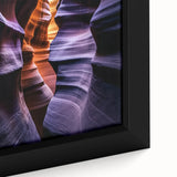 Close-up of a framed canvas depicting a stunning landscape of vibrant canyons, showcasing rich earthy tones and intricate details, perfect for home decor.