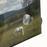 Close-up of a vibrant acrylic landscape artwork showcasing a serene countryside scene with lush green fields and rolling hills, ideal for home decor.