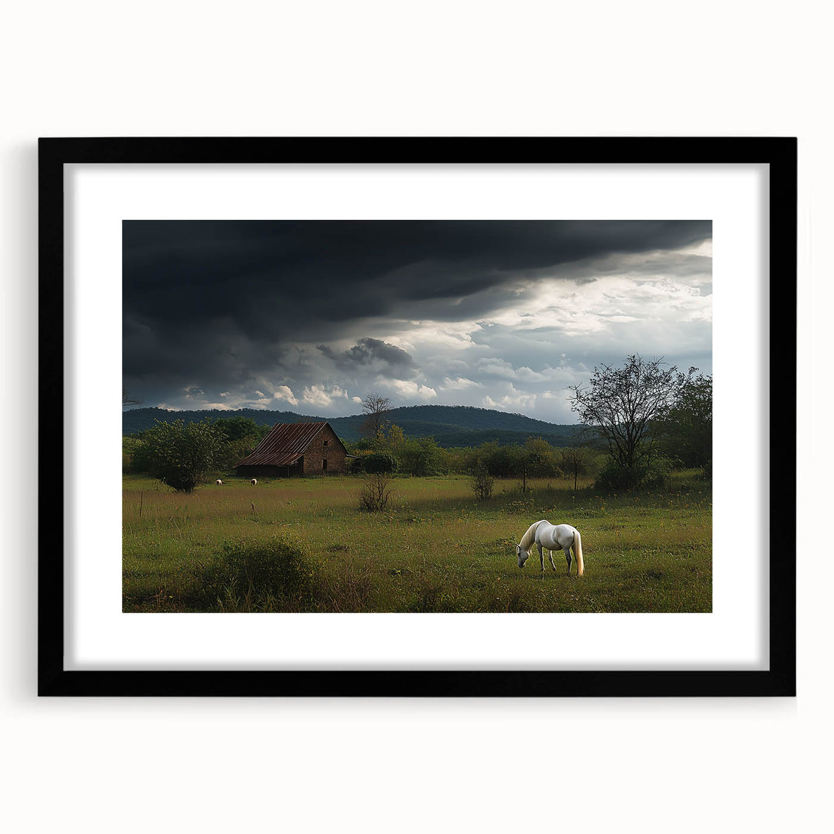 Black-framed landscape artwork depicting a serene countryside scene, featuring rolling hills and a clear blue sky, ideal for home decor or office ambiance.