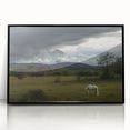 Framed acrylic landscape artwork showcasing a serene countryside scene, featuring vibrant green fields and a clear blue sky, elegantly presented in a sleek black frame.
