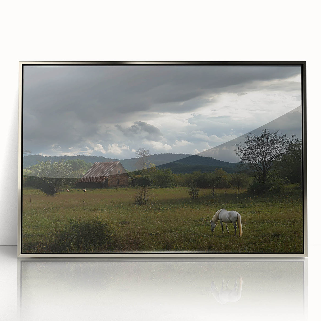 Framed acrylic artwork showcasing a serene countryside landscape with vibrant green fields and soft blue skies, enhanced by a sleek silver frame, ideal for home decor.